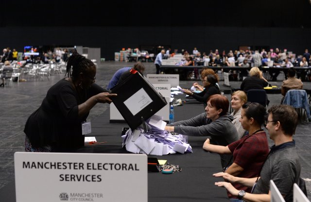 Election workers in the United Kingdom counting ballots following the country's vote on EU membership, June 24, 2015 Election workers in the United Kingdom counting ballots following the country's vote on EU membership, June 24, 2015